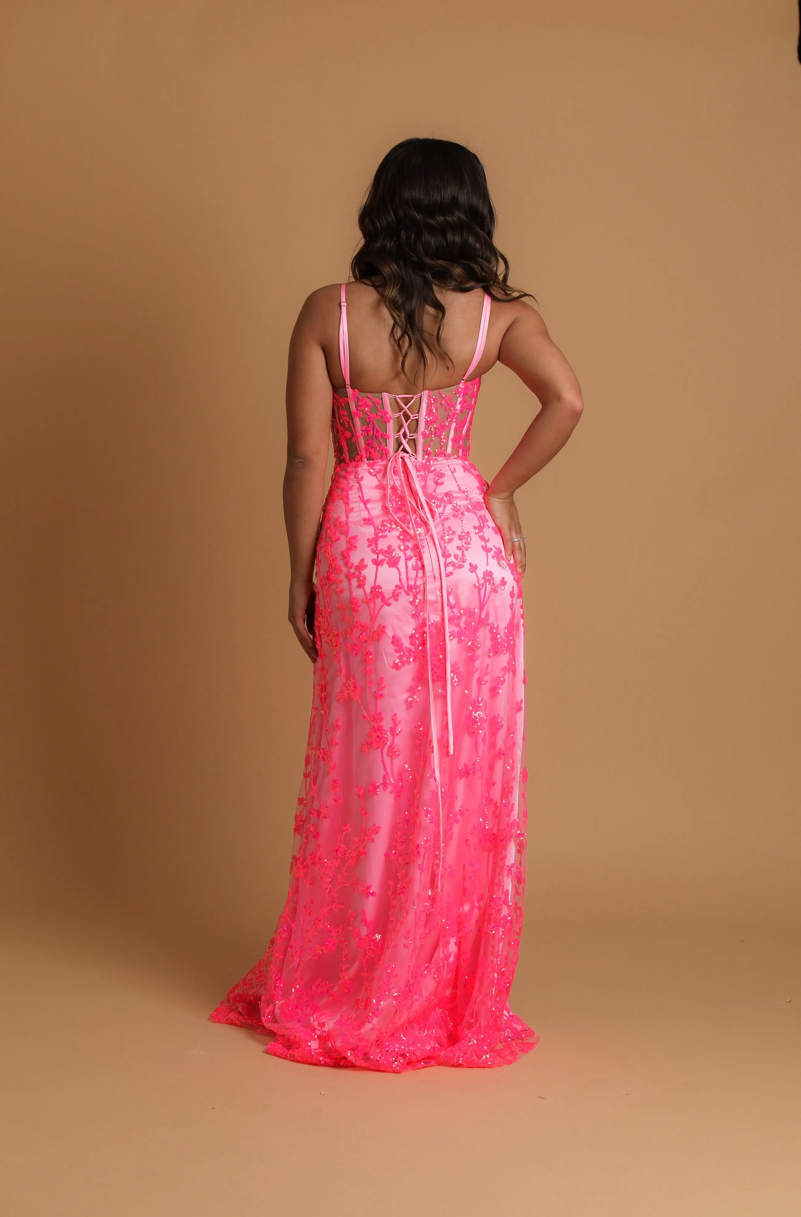 Sparkling pink dress with V neckline and corset back